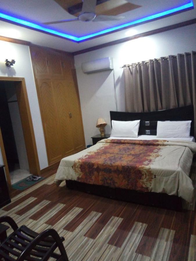Unique Lodge Islamabad Bagian luar foto